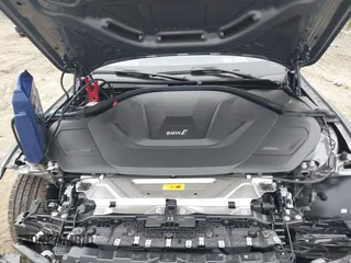 2024 BMW i4 eDrive35 z VIN WBY43AW05RFT22034, wystawiony jako IAAI lot #41545162 z przebiegiem 1499 mil mil oraz . Historia ofert i sprzedaży dostępna na DreamBid. Obrazek 10.