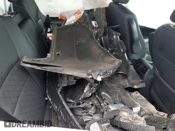2021 Honda Passport Touring z VIN 5FNYF7H94MB005741, wystawiony jako Copart lot #57626664 z przebiegiem Nie podano mil oraz Szkoda całkowita • Salvage title. Historia ofert i sprzedaży dostępna na DreamBid. Obrazek 13.