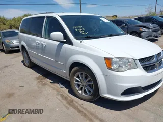 2014 Dodge Grand Caravan SXT with VIN 2C4RDGCG1ER429495, listed as a IAAI auction lot 42058513 with 136,936 mi miles and . Bid and sale history available at DreamBid. Image 1.