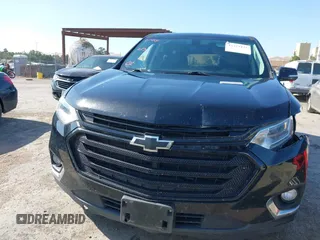 2019 Chevrolet Traverse LT Cloth z VIN 1GNEVGKW7KJ208656, wystawiony jako IAAI lot #42373422 z przebiegiem 132 863 mil mil oraz . Historia ofert i sprzedaży dostępna na DreamBid. Obrazek 13.