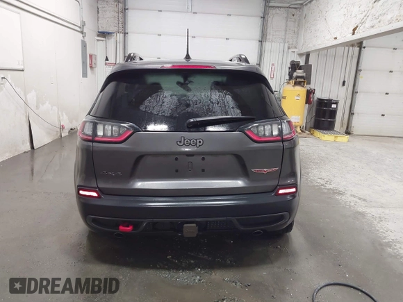2022 Jeep Cherokee Trailhawk z VIN 1C4PJMBX9ND514703, wystawiony jako IAAI lot #41761037 z przebiegiem 38 499 mil mil oraz . Historia ofert i sprzedaży dostępna na DreamBid. Obrazek 16.