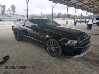 2010 Ford Mustang GT500 with VIN 1ZVBP8JS6A5114864, listed as a Copart auction lot 43198585 with 42,008 mi miles and Salvage title. Bid and sale history available at DreamBid. Image 4.