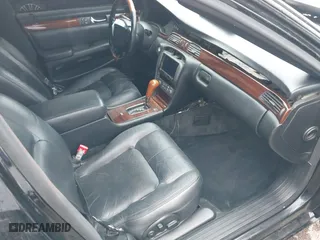 2002 Cadillac Seville Touring STS with VIN 1G6KY54982U239673, listed as a IAAI auction lot 41657709 with 92,224 mi miles. Bid and sale history available at carsss.com. Image 5.