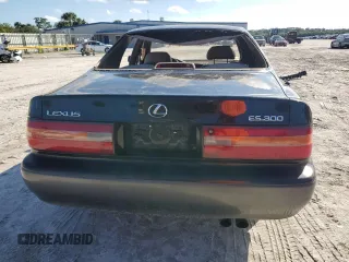 1996 Lexus ES 300 с VIN JT8BF12G4T0160599, выставлен на аукционе Copart как лот 87287404 с пробегом 132 013 миль миль и Списание • Salvage title. История ставок и продаж доступна на DreamBid. Изображение 6.