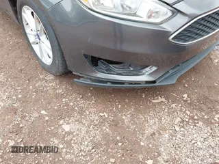 2016 Ford Focus SE z VIN 1FADP3F2XGL397092, wystawiony jako IAAI lot #42619802 z przebiegiem 232 252 mil mil oraz . Historia ofert i sprzedaży dostępna na DreamBid. Obrazek 6.