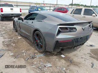 2014 Chevrolet Corvette Z51 3LT with VIN 1G1YL2D78E5128387, listed as a IAAI auction lot 42372075 with 136,632 mi miles and . Bid and sale history available at DreamBid. Image 3.