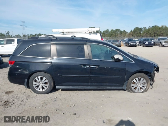 2015 Honda Odyssey EX-L with VIN 5FNRL5H65FB088106, listed as a IAAI auction lot 41880915 with 176,539 mi miles and . Bid and sale history available at carsss.com. Image 13.
