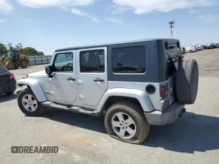 2007 Jeep Wrangler Unlimited Sahara with VIN 1J8GA59137L181360, listed as a Copart auction lot 62311225 with 151,393 mi miles and Salvage title. Bid and sale history available at DreamBid. Image 2.