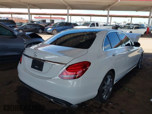 2016 Mercedes-Benz C 300 with VIN 55SWF4JB8GU118940, listed as a IAAI auction lot 42200451 with 113,220 mi miles and . Bid and sale history available at DreamBid. Image 4.