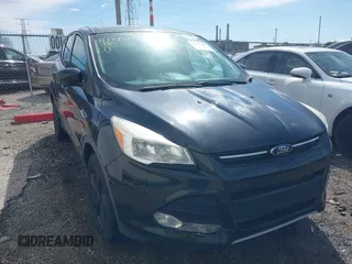 2015 Ford Escape SE z VIN 1FMCU0G73FUA15318, wystawiony jako IAAI lot #41797483 z przebiegiem 85 736 mil mil oraz . Historia ofert i sprzedaży dostępna na DreamBid. Obrazek 1.