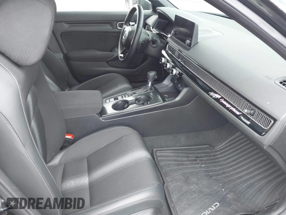 2023 Honda Civic Sport with VIN 19XFL2H82PE021151, listed as a IAAI auction lot 41943345 with 55,679 mi miles and . Bid and sale history available at DreamBid. Image 5.