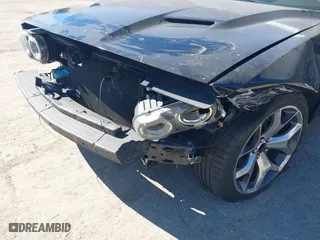 2016 Dodge Challenger SXT Plus with VIN 2C3CDZAG2GH301218, listed as a IAAI auction lot 41894825 with 124,209 mi miles. Bid and sale history available at carsss.com. Image 6.