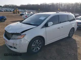 2014 Honda Odyssey Touring with VIN 5FNRL5H97EB037358, listed as a IAAI auction lot 41832825 with 208,894 mi miles and . Bid and sale history available at DreamBid. Image 17.