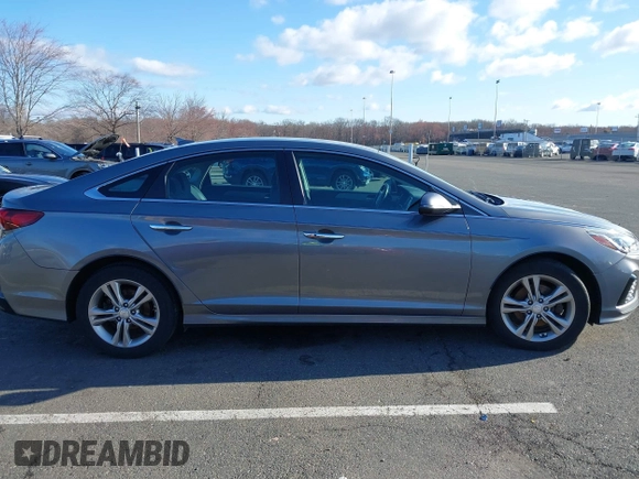 2018 Hyundai Sonata SEL with VIN 5NPE34AFXJH718120, listed as a IAAI auction lot 41847879 with 84,408 mi miles and . Bid and sale history available at carsss.com. Image 13.