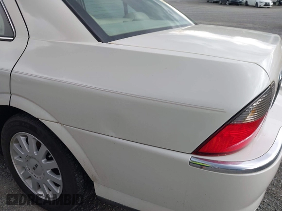 2005 Lincoln LS w/Luxury Pkg with VIN 1LNHM86S05Y640194, listed as a IAAI auction lot 41821098 with 196,063 mi miles. Bid and sale history available at carsss.com. Image 13.