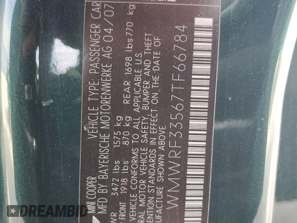 2007 MINI Convertible with VIN WMWRF33567TF66784, listed as a Copart auction lot 71571744 with 115,008 mi miles and Salvage Title. Bid and sale history available at DreamBid. Image 13.