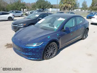 2025 Tesla Model 3 Long Range with VIN 5YJ3E1EB4SF876945, listed as a IAAI auction lot 41518965 with 591 mi miles. Bid and sale history available at carsss.com. Image 6.