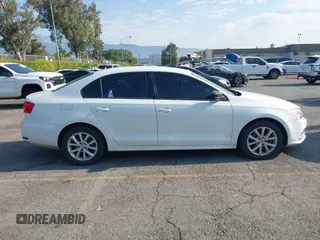 2015 Volkswagen Jetta SE with VIN 3VWD17AJ5FM258354, listed as a IAAI auction lot 42709041 with 191,338 mi miles and . Bid and sale history available at DreamBid. Image 13.
