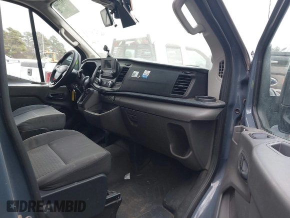 2020 Ford Transit Cargo with VIN 1FTBR3X85LKA55712, listed as a IAAI auction lot 41027144 with 125,658 mi miles. Bid and sale history available at carsss.com. Image 5.