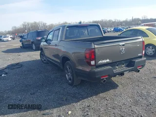 2022 Honda Ridgeline RTL z VIN 5FPYK3F51NB038239, wystawiony jako IAAI lot #41937070 z przebiegiem 39 012 mil mil oraz . Historia ofert i sprzedaży dostępna na DreamBid. Obrazek 3.