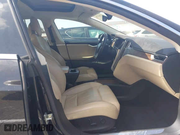 2017 Tesla Model S 100D with VIN 5YJSA1E26HF197176, listed as a IAAI auction lot 42565791 with 120,287 mi miles and . Bid and sale history available at DreamBid. Image 5.
