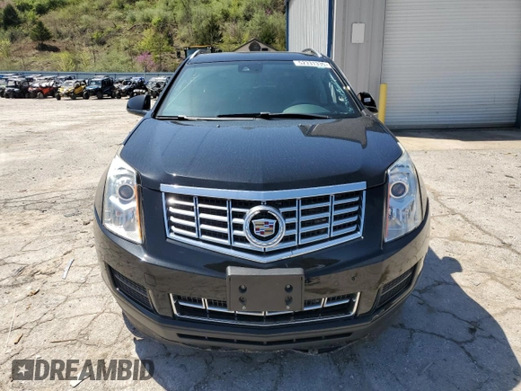 2014 Cadillac SRX Luxury Collection z VIN 3GYFNEE32ES647165, wystawiony jako Copart lot #52331335 z przebiegiem 27 277 mil mil oraz Szkoda całkowita • Salvage title. Historia ofert i sprzedaży dostępna na DreamBid. Obrazek 5.