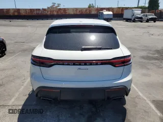 2025 Porsche Macan z VIN WP1AA2A58SLB01343, wystawiony jako Copart lot #54007455 z przebiegiem 1 415 mil mil oraz Szkoda całkowita • Salvage title. Historia ofert i sprzedaży dostępna na DreamBid. Obrazek 6.