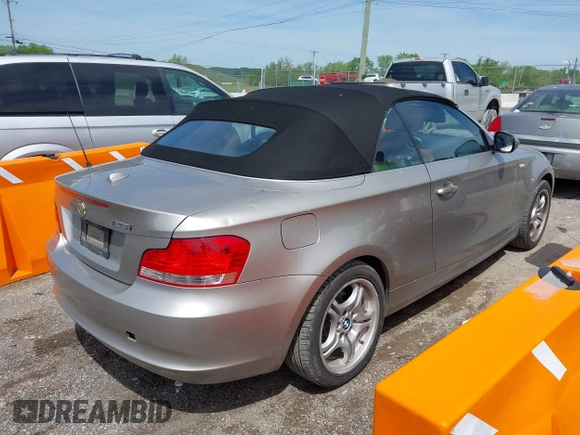 2011 BMW 1 Series 128i with VIN WBAUL7C5XBVE87044, listed as a IAAI auction lot 42095602 with 163,049 mi miles and . Bid and sale history available at carsss.com. Image 4.