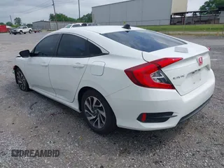 2018 Honda Civic LX with VIN 2HGFC2F59JH576975, listed as a IAAI auction lot 42098020 with 89,791 mi miles and . Bid and sale history available at DreamBid. Image 3.