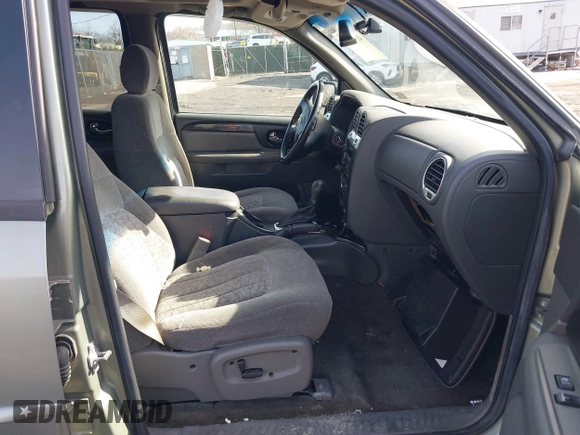 2004 GMC Envoy SLE with VIN 1GKDT13S942254932, listed as a IAAI auction lot 41509407 with 213,068 mi miles. Bid and sale history available at carsss.com. Image 5.