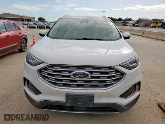 2020 Ford Edge SEL с VIN 2FMPK3J93LBB16928, выставлен на аукционе Copart как лот 63030385 с пробегом 81 567 миль миль и Чистый • Clean title. История ставок и продаж доступна на DreamBid. Изображение 5.