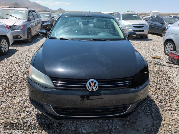 2013 Volkswagen Jetta SE with VIN 3VWDX7AJ8DM292073, listed as a Copart auction lot 59989585 with 129,697 mi miles and Salvage title. Bid and sale history available at DreamBid. Image 5.