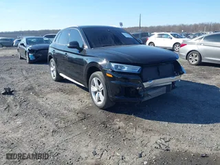 2018 Audi Q5 Premium with VIN WA1ANAFY2J2014099, listed as a IAAI auction lot 41647025 with 104,075 mi miles. Bid and sale history available at carsss.com. Image 1.