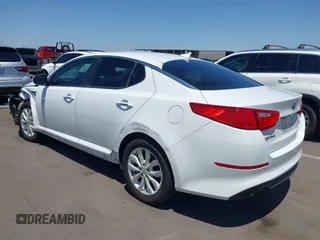 2015 Kia Optima EX z VIN 5XXGN4A72FG421289, wystawiony jako IAAI lot #42692024 z przebiegiem 91 000 mil mil oraz . Historia ofert i sprzedaży dostępna na DreamBid. Obrazek 3.