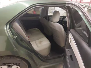 2015 Toyota Corolla L with VIN 2T1BURHE5FC232030, listed as a IAAI auction lot 41649086 with 97,876 mi miles. Bid and sale history available at carsss.com. Image 8.