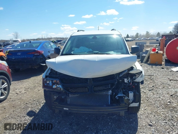 2020 Dodge Journey SE Value with VIN 3C4PDCABXLT265228, listed as a IAAI auction lot 41843599 with 53,797 mi miles and . Bid and sale history available at carsss.com. Image 12.