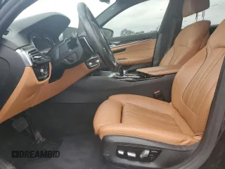 2018 BMW 5 Series 540i with VIN WBAJE5C54JWA93338, listed as a Copart auction lot 54312385 with 77,537 mi miles and Salvage title. Bid and sale history available at DreamBid. Image 7.