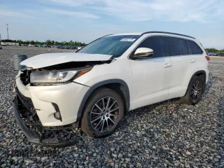 2018 Toyota Highlander SE with VIN 5TDJZRFH9JS823259, listed as a Copart auction lot 64882735 with 97,401 mi miles and Salvage title. Bid and sale history available at DreamBid. Image 1.