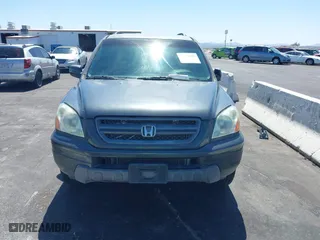 2004 Honda Pilot EX with VIN 2HKYF18514H623272, listed as a IAAI auction lot 42020669 with 186,766 mi miles. Bid and sale history available at carsss.com. Image 13.