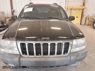 2002 Jeep Grand Cherokee Laredo with VIN 1J4GW48SX2C118434, listed as a IAAI auction lot 42036464 with 187,263 mi miles. Bid and sale history available at carsss.com. Image 6.