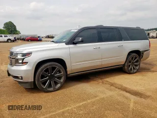 2016 Chevrolet Suburban LTZ with VIN 1GNSKJKC7GR409867, listed as a Copart auction lot 57313275 with 235,080 mi miles and Salvage title. Bid and sale history available at DreamBid. Image 1.