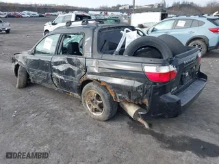 2003 Subaru Baja with VIN 4S4BT61C536100698, listed as a IAAI auction lot 41613071 with 221,393 mi miles. Bid and sale history available at carsss.com. Image 3.