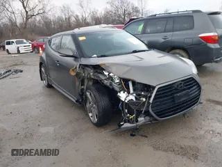 2013 Hyundai Veloster Turbo with VIN KMHTC6AE8DU171669, listed as a IAAI auction lot 41661874 with 71,980 mi miles and . Bid and sale history available at DreamBid. Image 1.