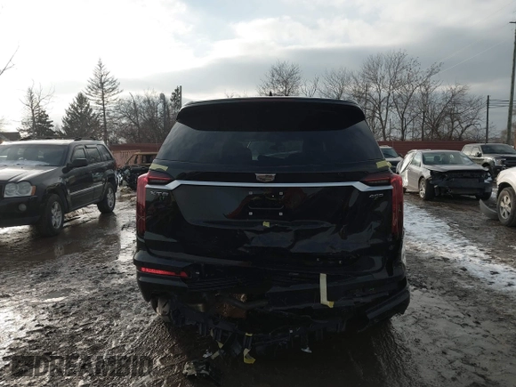 2025 Cadillac XT6 FWD Premium Luxury with VIN 1GYKPCRS6SZ104902, listed as a IAAI auction lot 41565224 with 4,735 mi miles and . Bid and sale history available at DreamBid. Image 16.