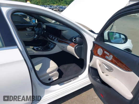 2018 Mercedes-Benz E 300 with VIN WDDZF4KB4JA370171, listed as a IAAI auction lot 42404611 with 92,944 mi miles and . Bid and sale history available at DreamBid. Image 5.