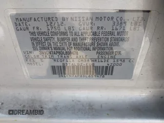 2013 Nissan Versa S Plus z VIN 3N1CN7AP8DL859478, wystawiony jako IAAI lot #42098071 z przebiegiem 107 941 mil mil oraz . Historia ofert i sprzedaży dostępna na DreamBid. Obrazek 9.