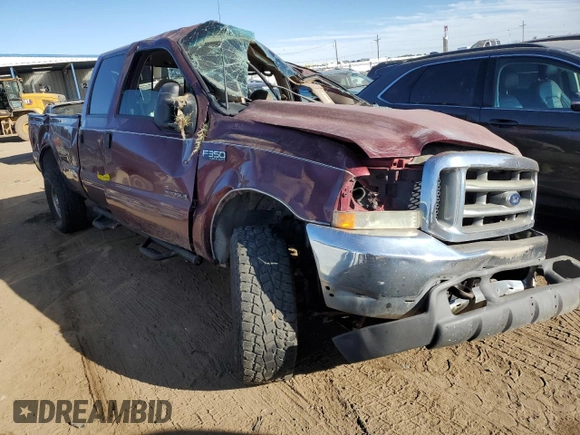 2000 Ford F-350 XL with VIN 1FTSW31F8YEA63048, listed as a Copart auction lot 72357514 with 159,954 mi miles and Salvage Title. Bid and sale history available at DreamBid. Image 4.