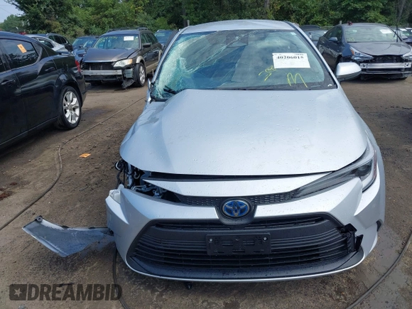 2023 Toyota Corolla Hybrid LE with VIN JTDBDMHE5P3000797, listed as a IAAI auction lot 40206015 with 22,371 mi miles. Bid and sale history available at carsss.com. Image 13.
