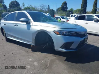 2023 Honda Civic EX z VIN 2HGFE1F74PH308480, wystawiony jako IAAI lot #41874607 z przebiegiem Nie podano mil oraz . Historia ofert i sprzedaży dostępna na DreamBid. Obrazek 1.