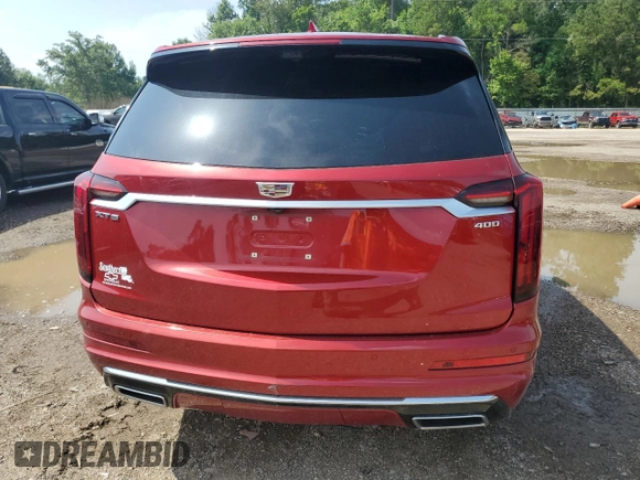 2022 Cadillac XT6 Premium Luxury with VIN 1GYKPCRS7NZ101706, listed as a Copart auction lot 63389985 with 27,021 mi miles and Salvage title. Bid and sale history available at DreamBid. Image 6.